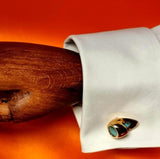 Mannequin's hand with bronze cufflink